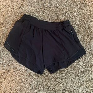Size 6 black lululemon athletica hotty hot shorts high rise 2.5” good condition